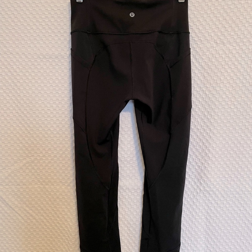 Black Lululemon size 6 leggings with side pockets